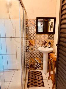 Ванна кімната в Chalé Na Mata