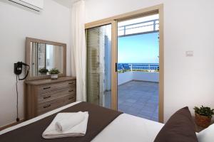 Postel nebo postele na pokoji v ubytování Cape Panorama Villa