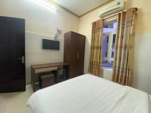Ліжко або ліжка в номері Nhà Khách 206 đà nẵng