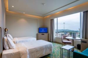 Holiday Inn Katra Vaishno Devi by IHG客房内的一张或多张床位