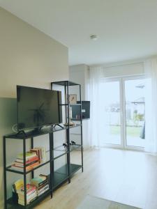 TV a/nebo společenská místnost v ubytování Ferienwohnung Martinsesch