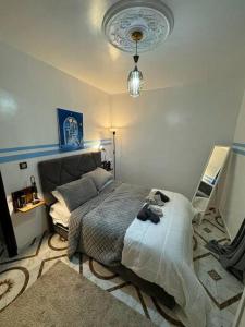 a bedroom with a large bed in a room at Dar Saphire in Chefchaouen