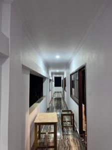 Voodi või voodid majutusasutuse ANAND Beach Guesthouse by Moonrocks toas