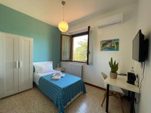 A bed or beds in a room at Agriturismo con cucina Il Favaio