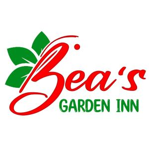 a red number seven with green leaves and the text sea s garden inn at Bea's Garden Inn in Puerto Princesa City