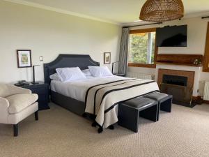 Postel nebo postele na pokoji v ubytování Casa Molino Hotel Boutique & Restaurant Puerto Varas