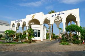 a building with a sign on the side of it at Savoy Sharm El Sheikh in Sharm El Sheikh