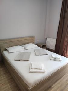 Letto o letti in una camera di FRESH Hotel Kobuleti