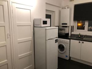 Cuina o zona de cuina de Lovely 3 bedroom North london