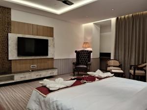 Voodi või voodid majutusasutuse Hotel k11 toas