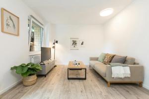 Svetainės erdvė apgyvendinimo įstaigoje Home & Coliving Bremen