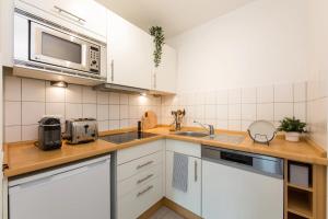 Virtuvė arba virtuvėlė apgyvendinimo įstaigoje Home & Coliving Bremen