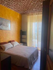 Llit o llits en una habitació de Casetta di Valerio