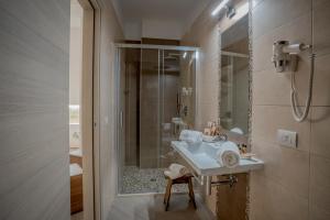 Koupelna v ubytování Tufo Bianco Relais