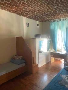 Llit o llits en una habitació de Casetta di Valerio