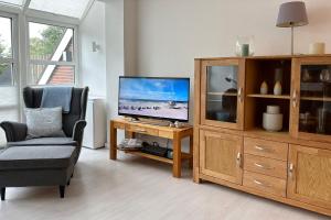 TV a/nebo společenská místnost v ubytování Westhüs 13