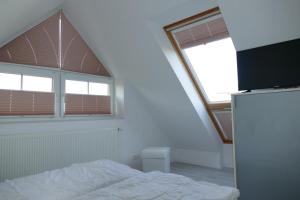 Posteľ alebo postele v izbe v ubytovaní Turmresidenz App. 9