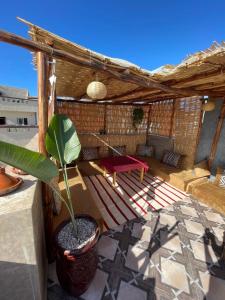Ein Balkon oder eine Terrasse in der Unterkunft ASNFU AUBERGe