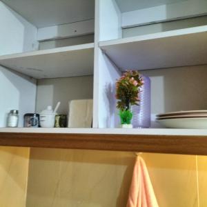 Bonsai Cozy Homes tesisinde mutfak veya mini mutfak