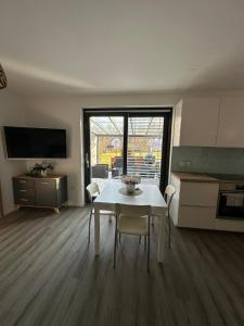 Kuchyň nebo kuchyňský kout v ubytování Apartma Dreamscape