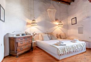 Postel nebo postele na pokoji v ubytování Villa Vrissi