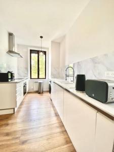 Dapur atau dapur kecil di Appartement complet chic et cosy