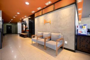 Posezení v ubytování HUS Hotel MARINGA