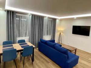 TV a/nebo společenská místnost v ubytování Apartmány TWINS