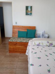En eller flere senger på et rom på Casa aconchegante - Localizada à 300 metros do Forrogaço