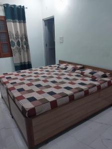 Posteľ alebo postele v izbe v ubytovaní Ashirwad Home Stay