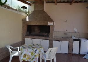 Η κουζίνα ή μικρή κουζίνα στο Casa ideal hasta 7pax con cochera propia