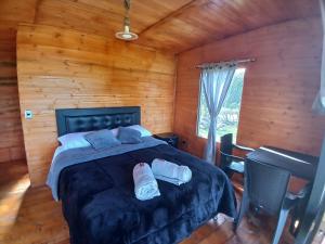 Postel nebo postele na pokoji v ubytování Cabañas Finca las acacias