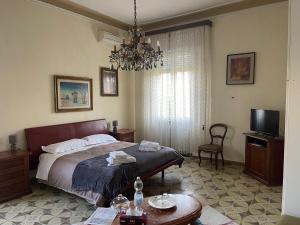 Postel nebo postele na pokoji v ubytování ViaEmilia