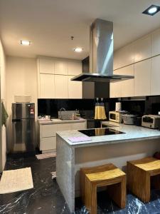 Kjøkken eller kjøkkenkrok på G Dau Homestay