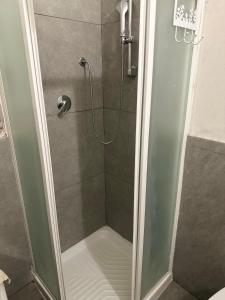 a shower with a glass door in a bathroom at K.room2 