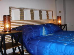 Tempat tidur dalam kamar di Parva Domus in 29