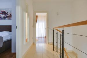 Posteľ alebo postele v izbe v ubytovaní Villa Aurea
