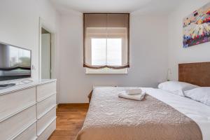 Posteľ alebo postele v izbe v ubytovaní Villa Aurea