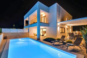 Bazén v ubytovaní Villa Aurea alebo v jeho blízkosti