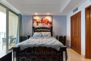 Postel nebo postele na pokoji v ubytování Luxurious Ocean View Suite