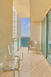 Balkón nebo terasa v ubytování Luxurious Ocean View Suite