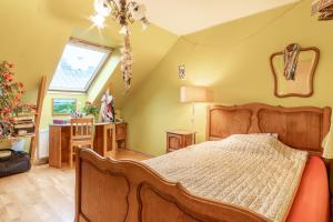a bedroom with a bed and a window at HermiinStay - apartment with sauna and hot tub in Tartu +20 photos