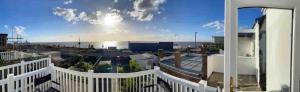 a view of a city from a balcony of a building at Norfolk Home On Hunstanton Beach Promenade in Hunstanton