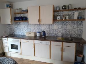 Η κουζίνα ή μικρή κουζίνα στο Ferienhaus -Wesertal