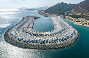 an aerial view of a resort island in the ocean at Al Dana Sea View Villa in Fujairah