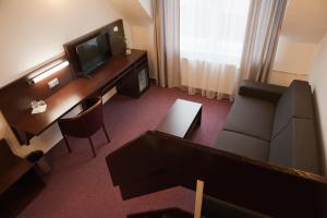 TV a/nebo společenská místnost v ubytování Hotel Vír