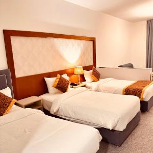 Postelja oz. postelje v sobi nastanitve Aquavista Hotel & Suites