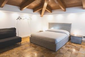 A bed or beds in a room at B&B Palazzo Storico Di Nicola