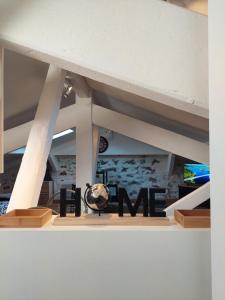 a museum display with a statue in the middle of a building at Loft Cosy NICE centre ville in Nice +26 photos