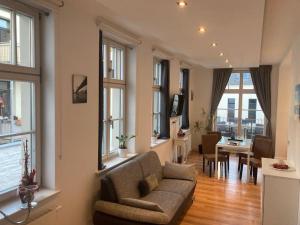 Ein Sitzbereich in der Unterkunft Downtown Apartments Leipzig